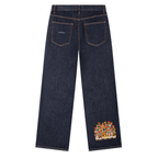 Back of the dark indigo jeans with a group of traditional Gujarati musicians printed near the hem and a small આરવેઇન wordmark on the back pocket