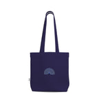 Mor canvas tote in navy with a detailed peacock print, front