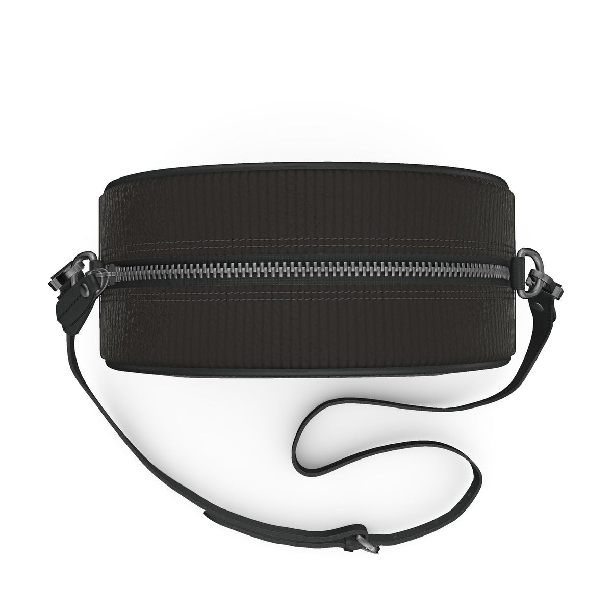Round box bag from above with the strap laid out
