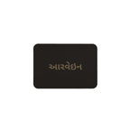 Leather label on the grid tote with the Aarvein wordmark in Gujarati, આરવેઇન