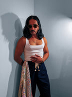 Model with the Ornamental Mor silk twill scarf tied at the waist
